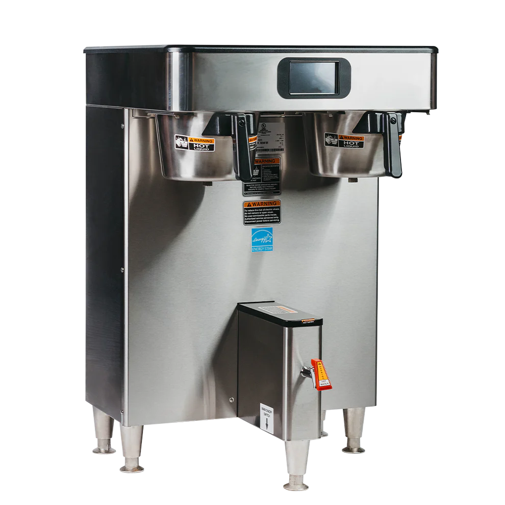 Stainless steel commercial coffee machine on a white background