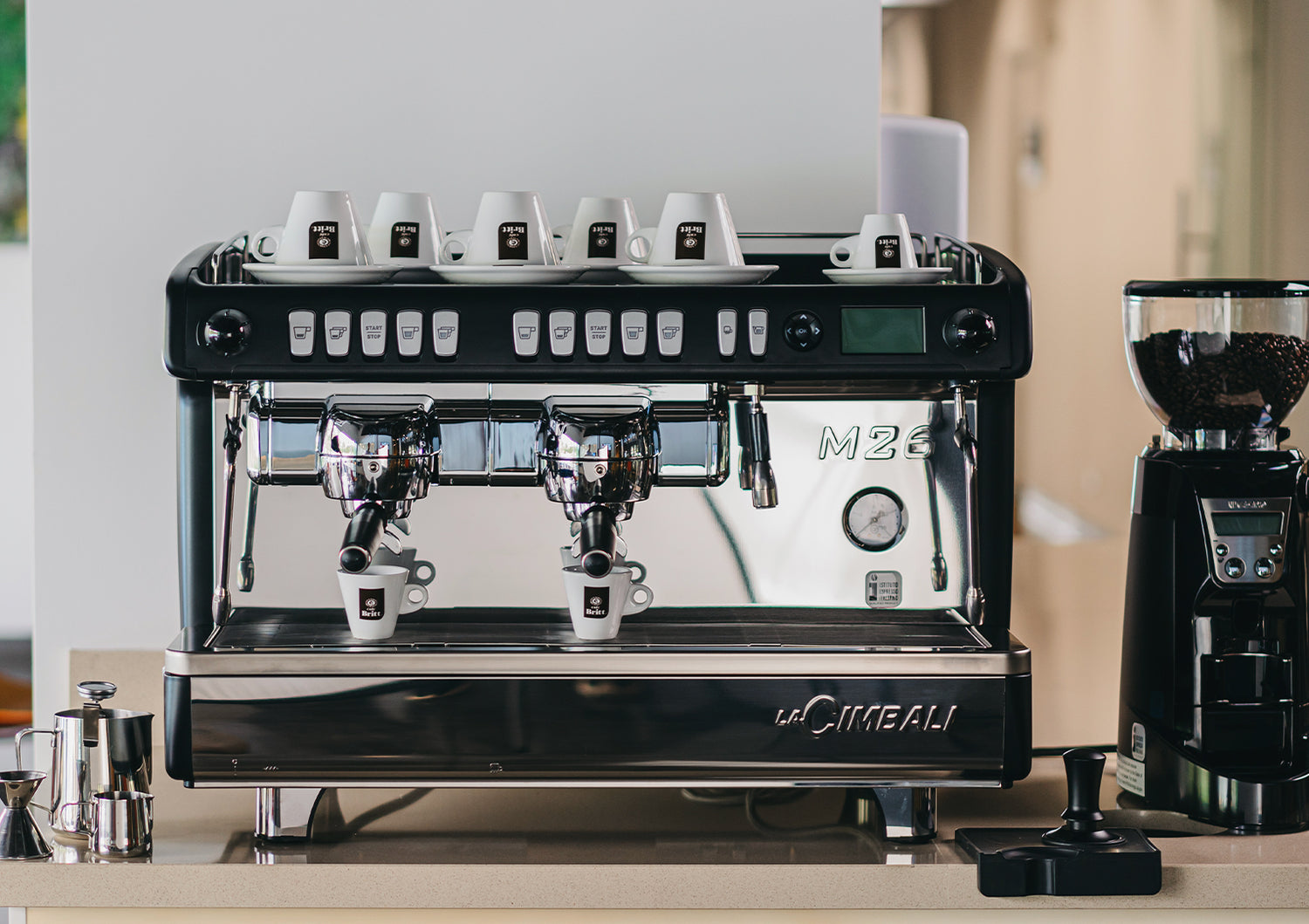 Cimbali M26 SE commercial espresso machine for Café Britt gourmet Costa Rican coffee.