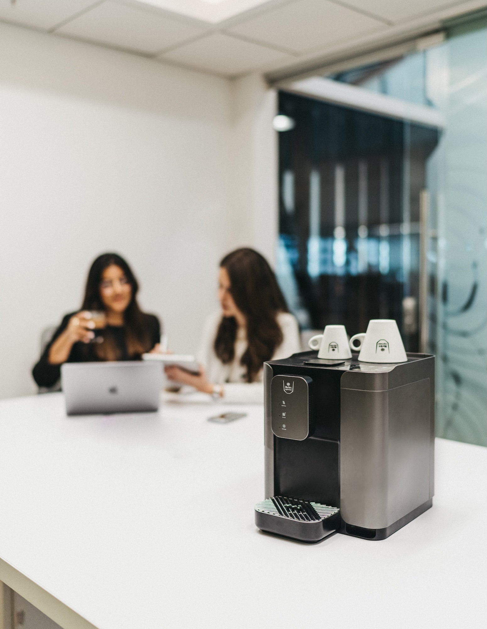 Britt Espresso Capsule Coffee Machine in a Meeting Room