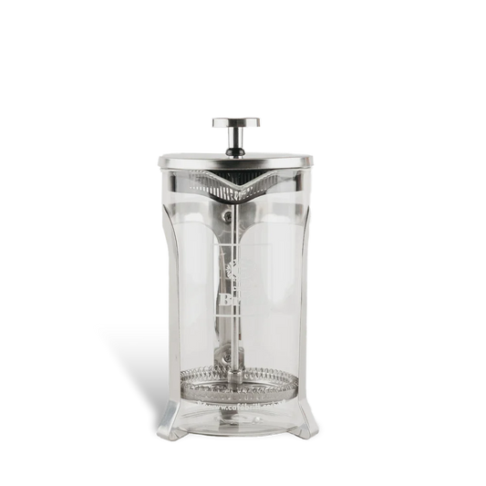 Clear glass French press coffee maker on a white background