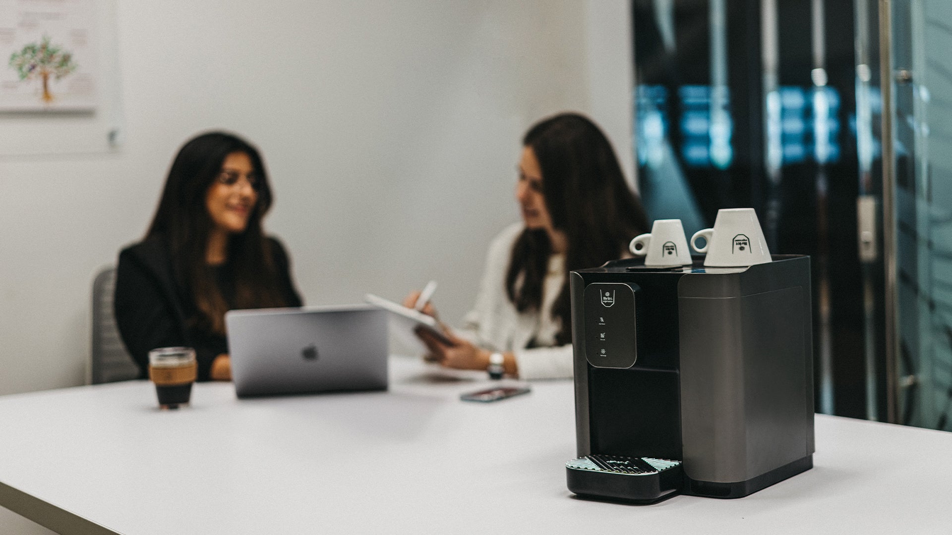 Britt Espresso Capsule Coffee Machine in a meeting room