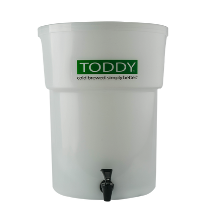 White Toddy cold brew coffee maker with a green logo on a white background